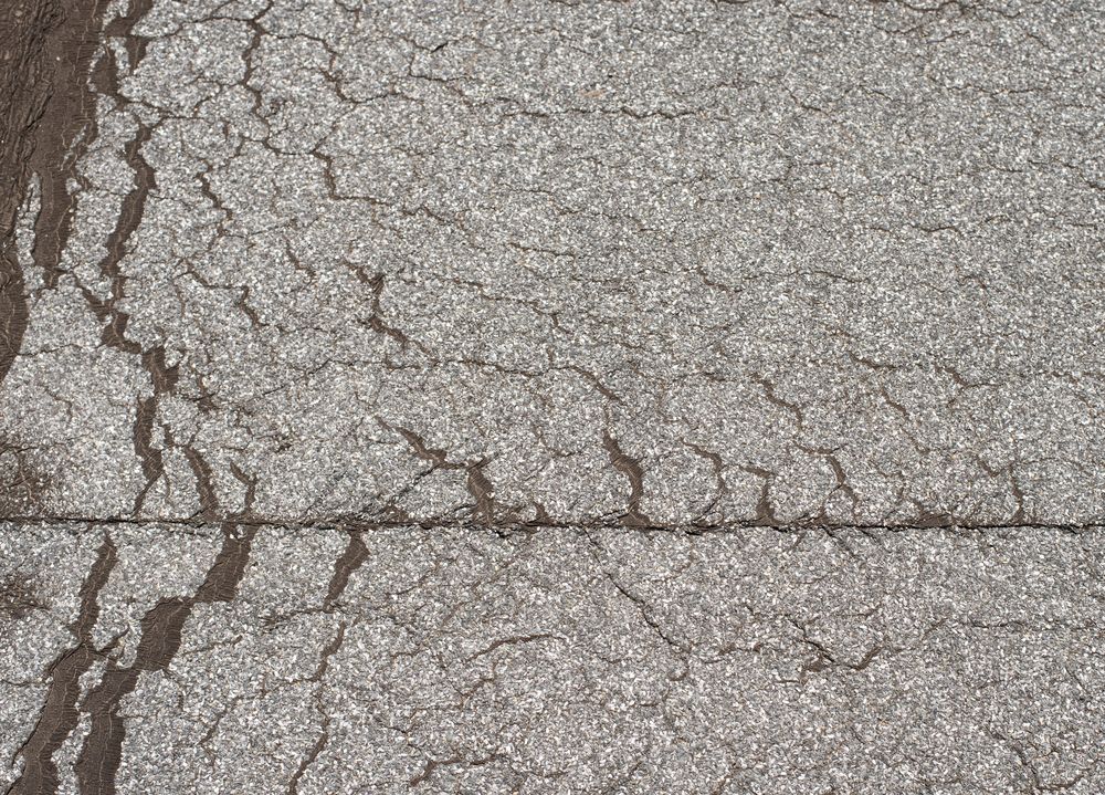 Losliggend dakleer op plat dak in Vaassen
